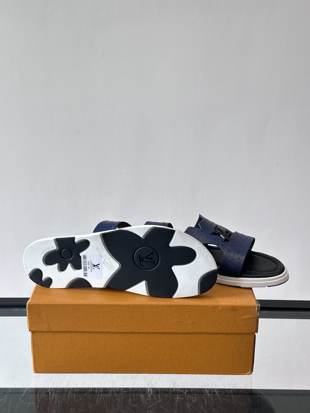 Louis Vuitton Embossed Blue Slide Sandals — side