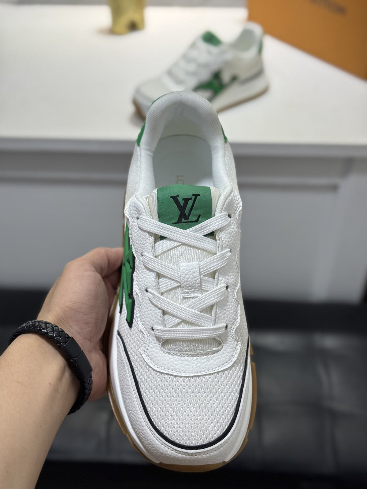 Louis Vuitton Low-Top Logo Sneakers — front