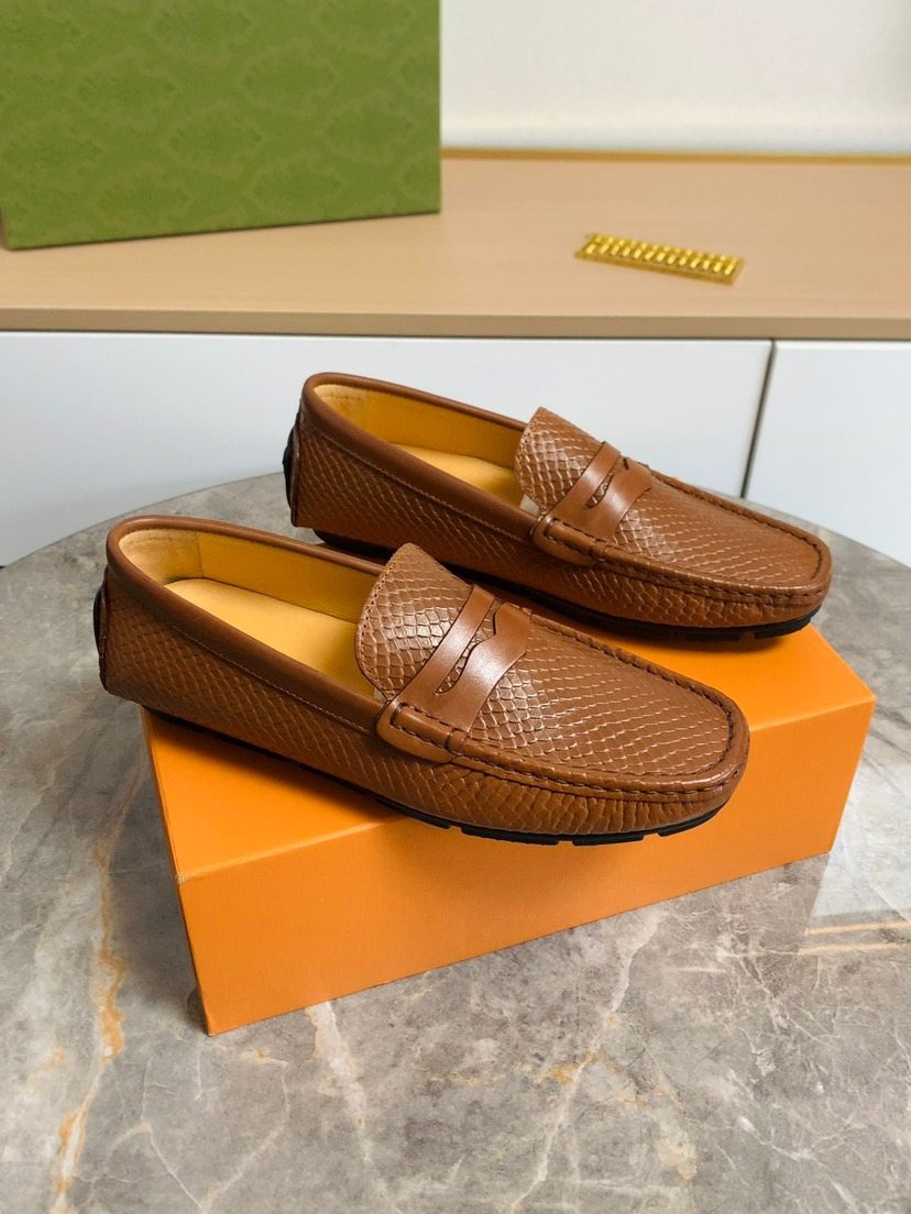 Louis Vuitton Textured Penny Loafers — front