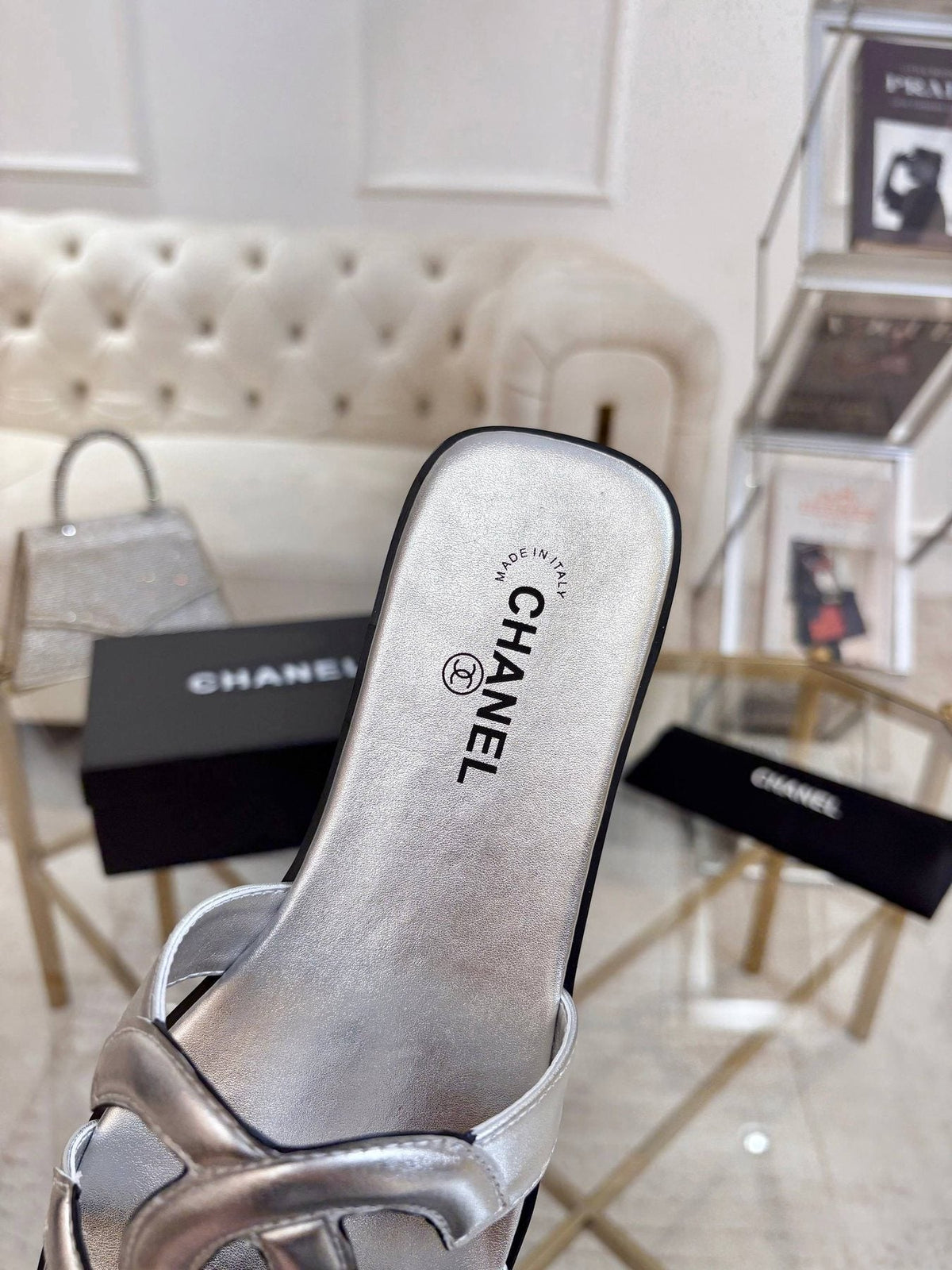 Chanel Embossed Logo Slide Sandals — side