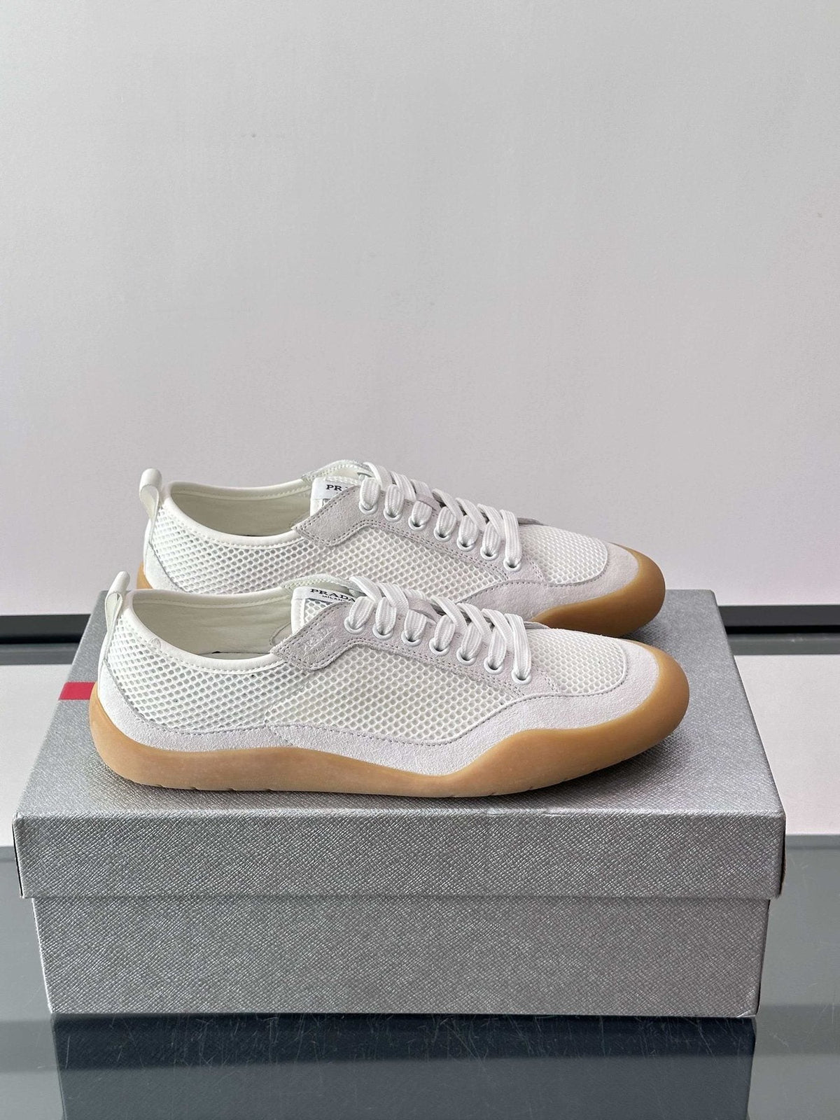 Prada Low-Top Perforated Sneakers — front