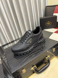 Prada Triangle Plaque Lace-Up Sneakers — hero